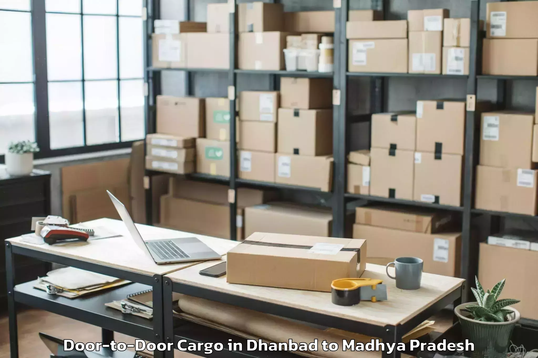 Affordable Dhanbad to Rewa Door To Door Cargo